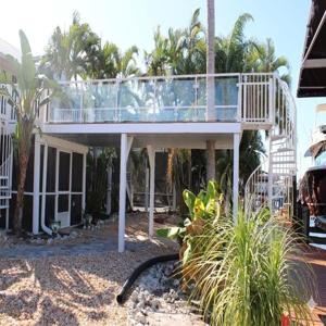 Railing Company for modern cable stair railing and loft railing fabricated by AMD Ornamental LLC stair contractor and railing company serving Naples Marco Island Bonita Springs Estero Fort Myers and Cape Coral Florida